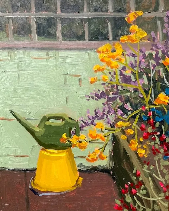 Green Watering Can on a Yellow Bucket