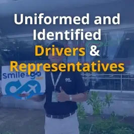 Smile & Go Taxi uniformed bilingual driver wearing official ID badge and company polo shirt