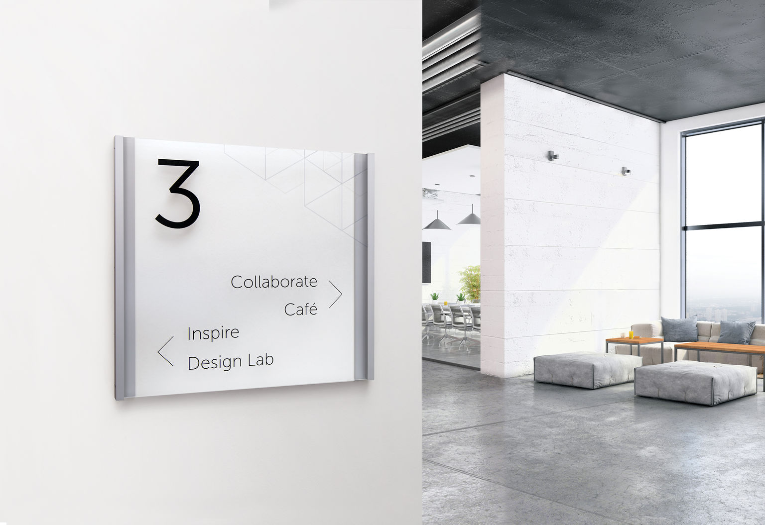 Contemporary loft office space featuring a minimalist metal and glass-look directional sign.