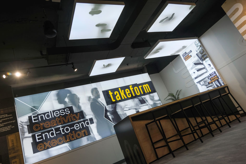 Our showroom bar area surrounded by custom printed illuminated silicon edge graphics.