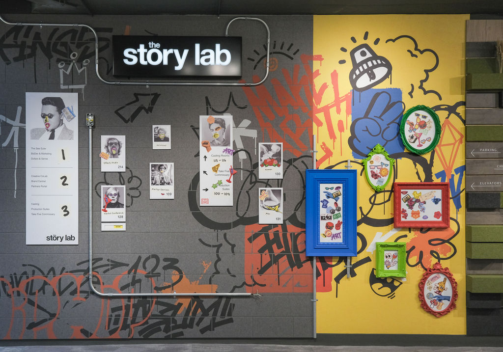 A bold, irreverent experiential graphics concept for Story Lab, including magnetic signage and custom-printed acoustic tiles.