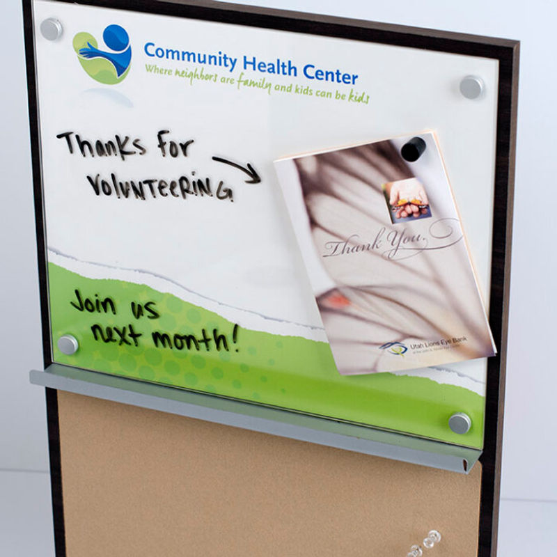 View unit with dry-erase, magnetic, acrylic lens, changeable paper insert and tackable surface.