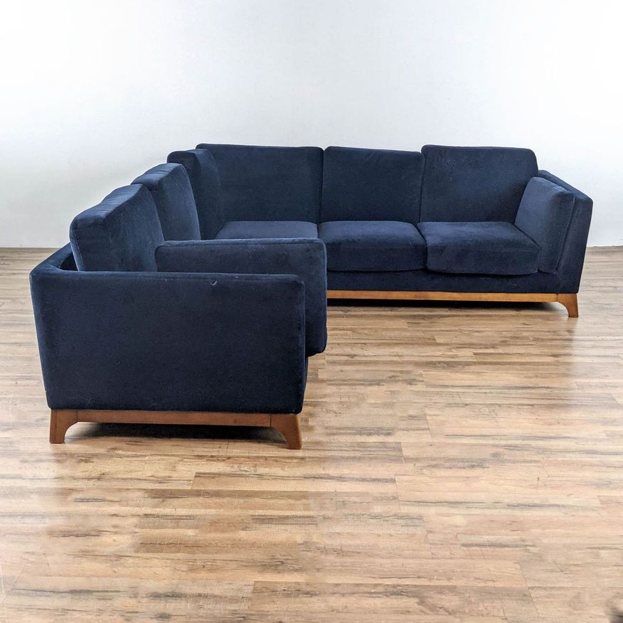 Blue Upholstered Sectional Sofa - image 0