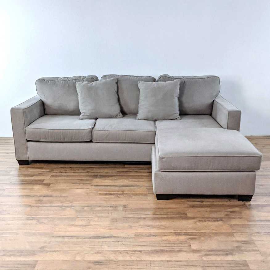 Living Spaces Gray Sectional Sofa - image 0