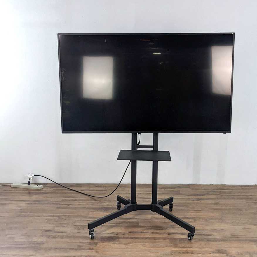 Sceptre 65 Inch 4K UHD LED TV + Yaheetech Mobile Stand.  - image 0