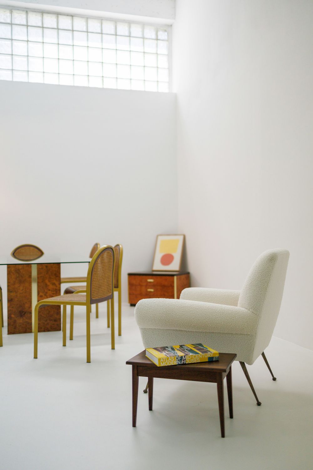 West Elm walnut dining table styled with mixed vintage chairs