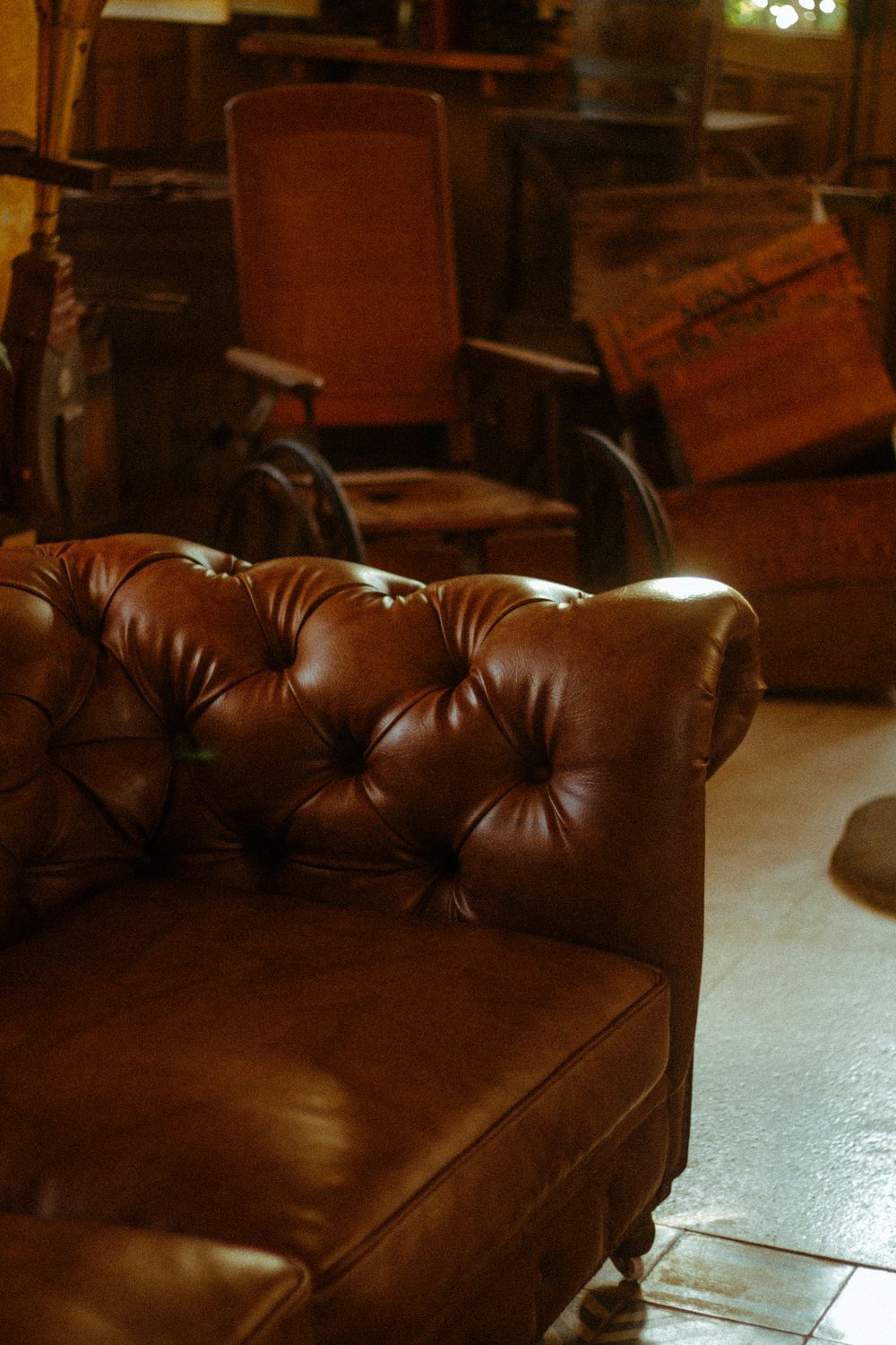 Vintage sofa and media console ready for pickup in a consignment store