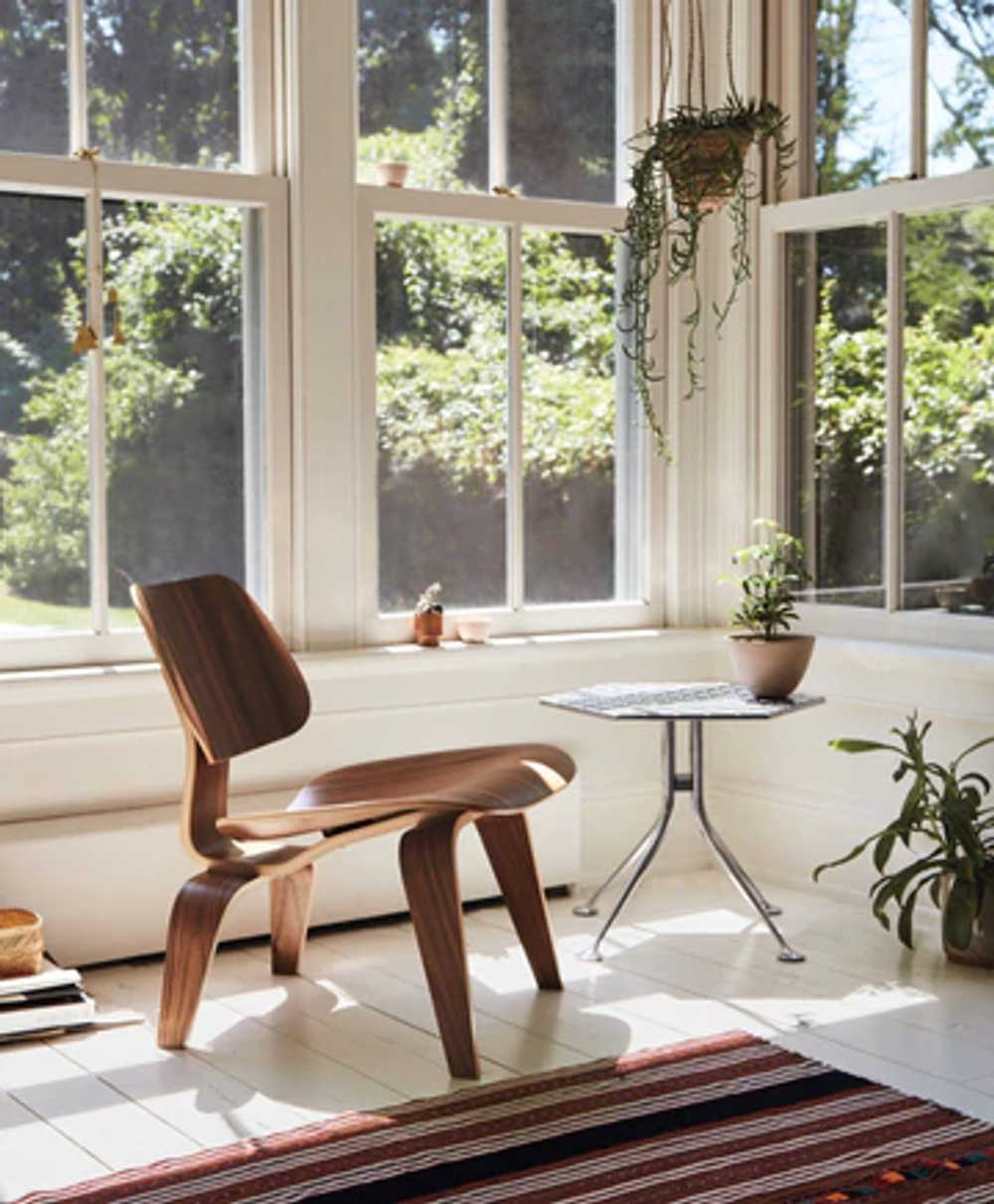 Charles and Ray Eames' Molded Plywood Chairs, pioneering design marrying form and function.