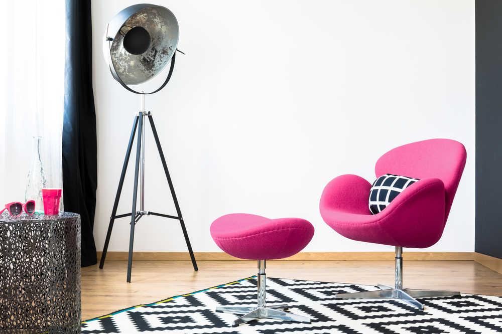 Arne Jacobsen's Swan Chair, organic elegance with fluid lines.
