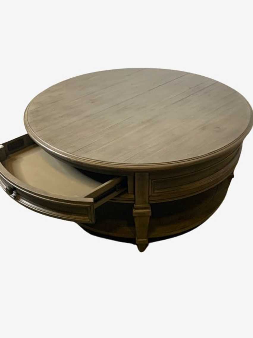 Haverty's Two-Drawer Round Distressed Gray Coffee Table on Wheels - image 0