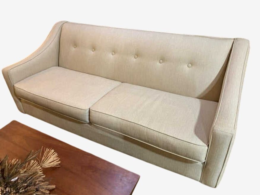 Cream Tufted Sofa With Sleigh Arms - image 0