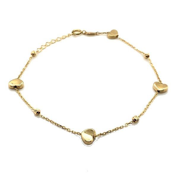 Złota bransoletka z serduszkami i diamentowanymi kulkami