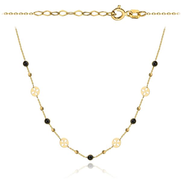 Złoty naszyjnik z czarnymi kamieniami i ażurowymi kółeczkami