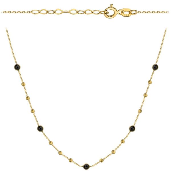 Złoty naszyjnik z czarnymi kamieniami i diamentowanymi kulkami