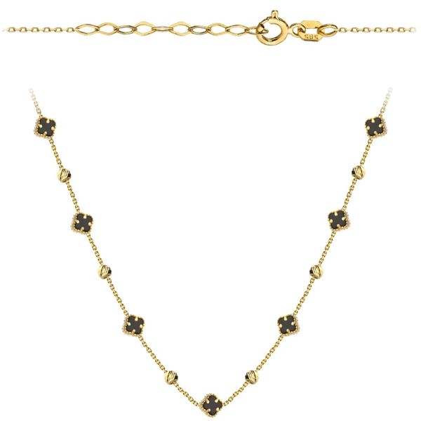 Złoty naszyjnik z czarnymi koniczynkami i kuleczkami