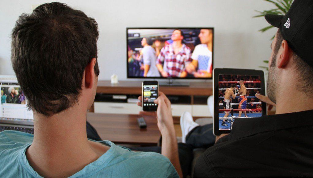 People use multiple devices and share content information while watching TV