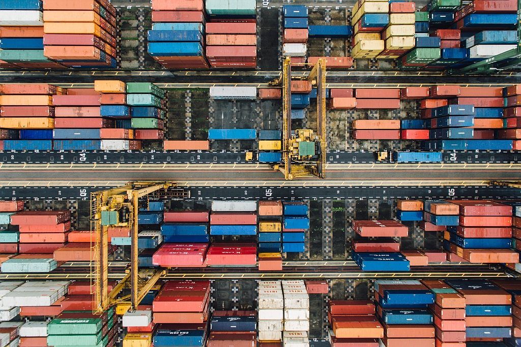 Container pallets aerial view 
Photo by chuttersnap on Unsplash