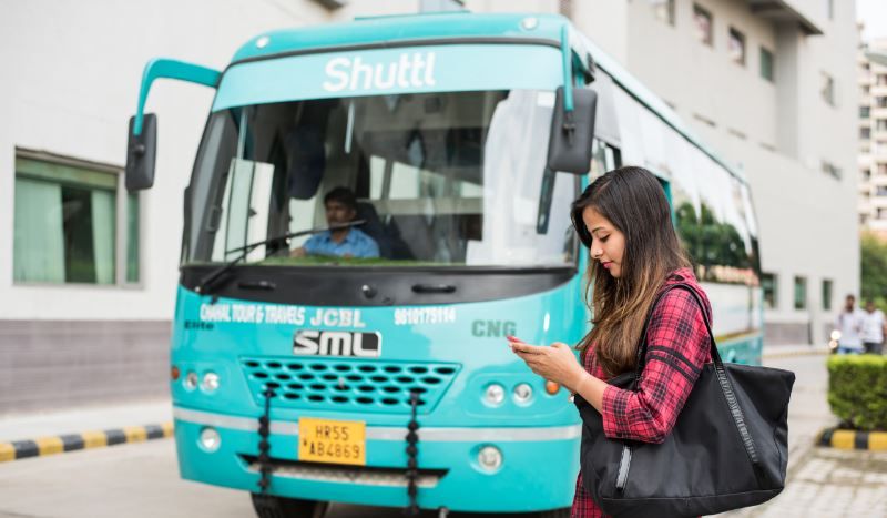 A Shuttl customer about to board a bus