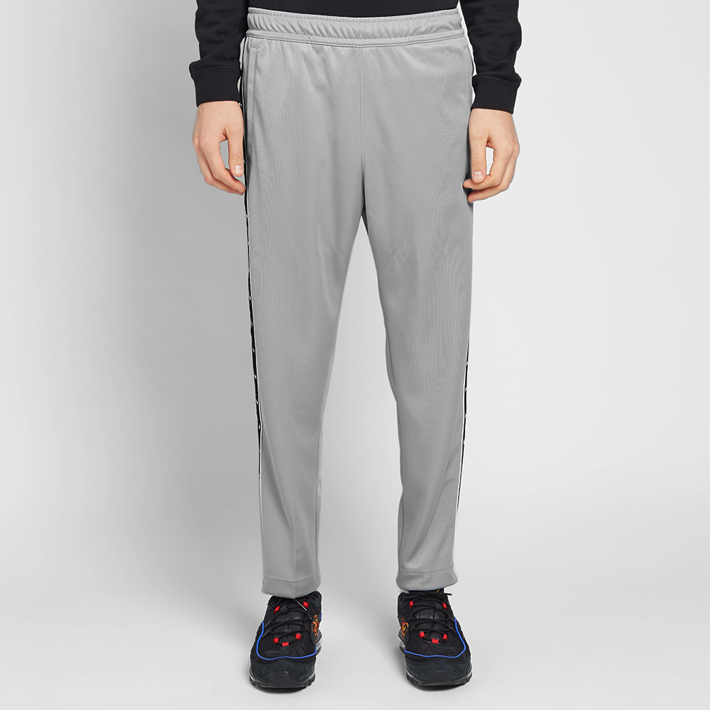 nike taped track pants