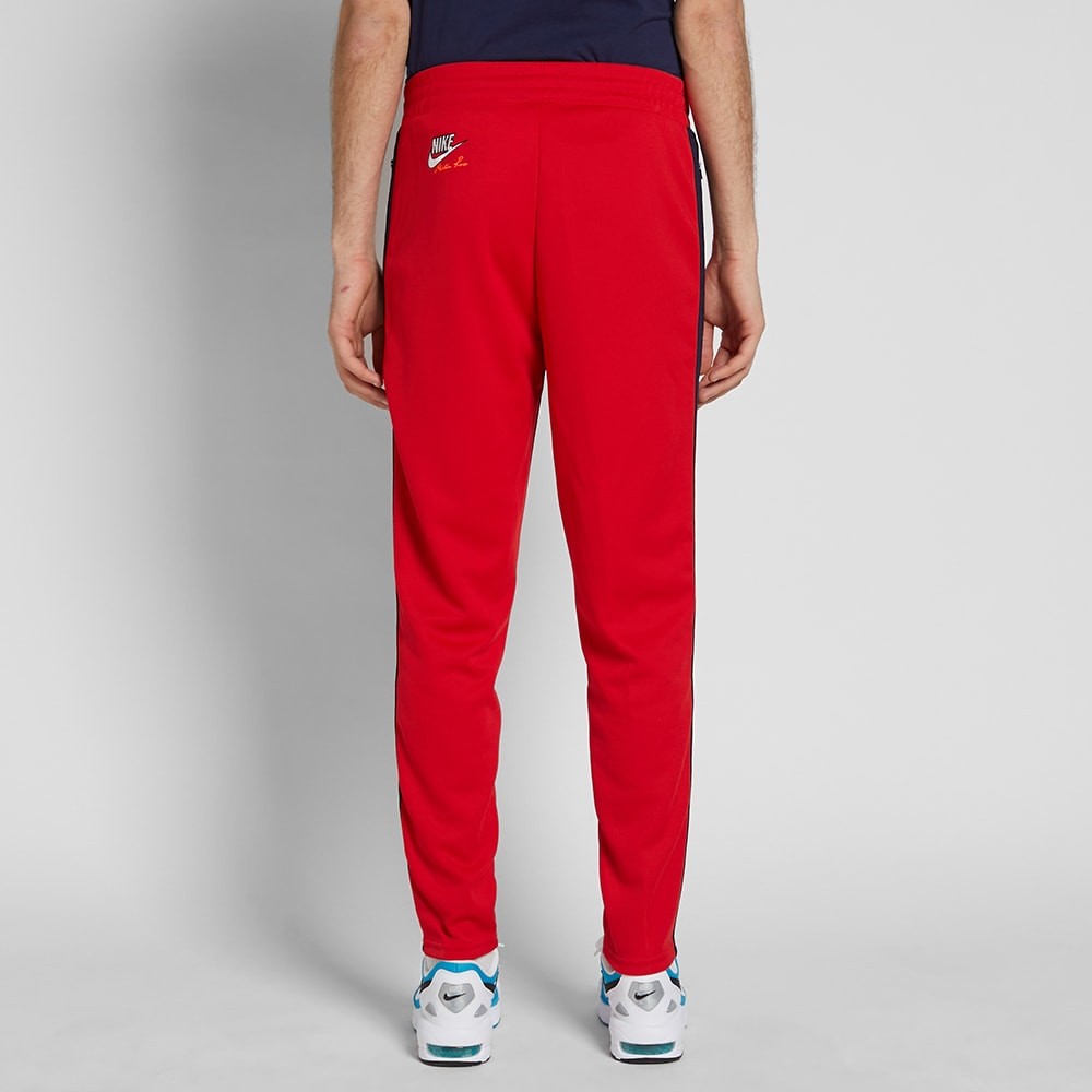 red nike track pants