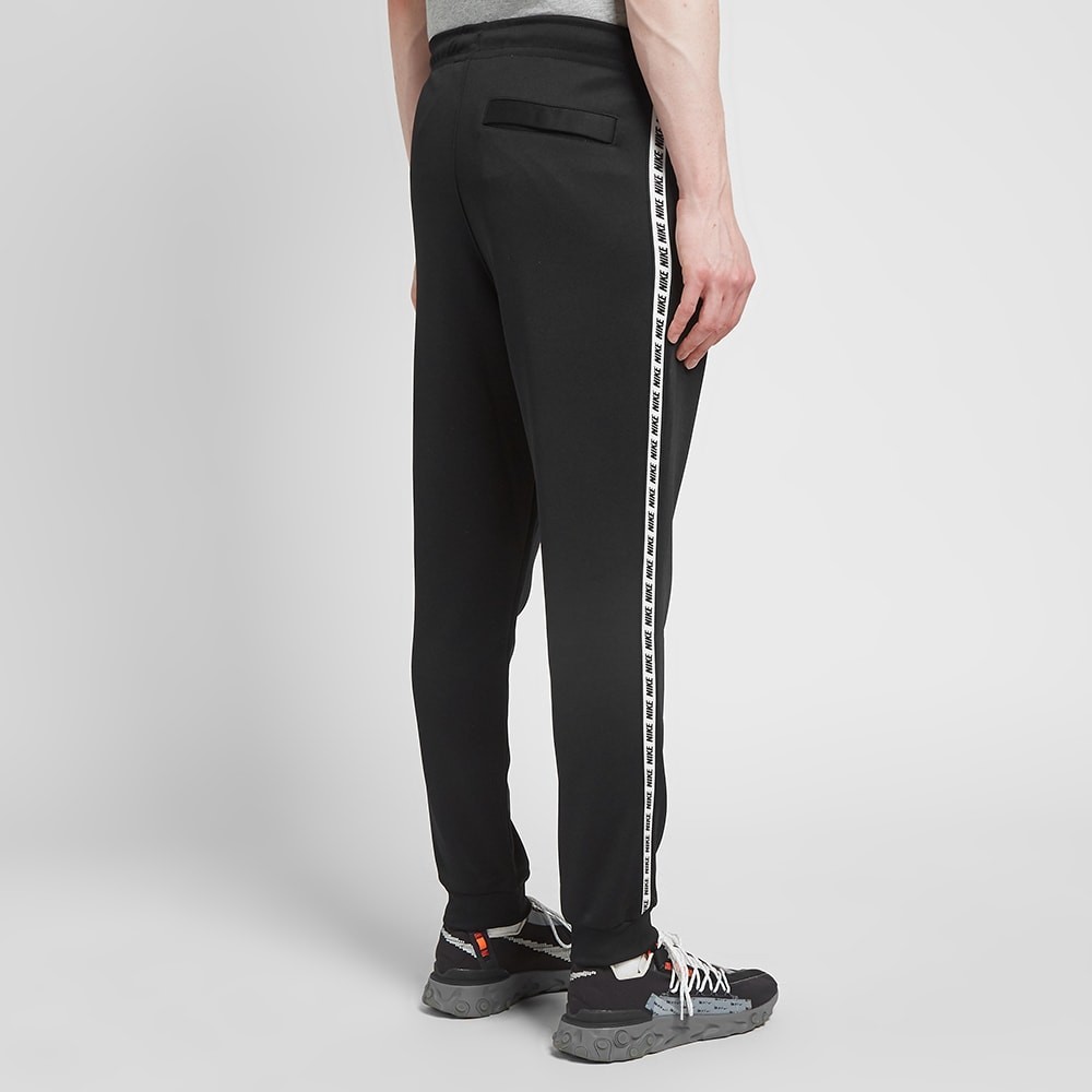 nike tape track pants black