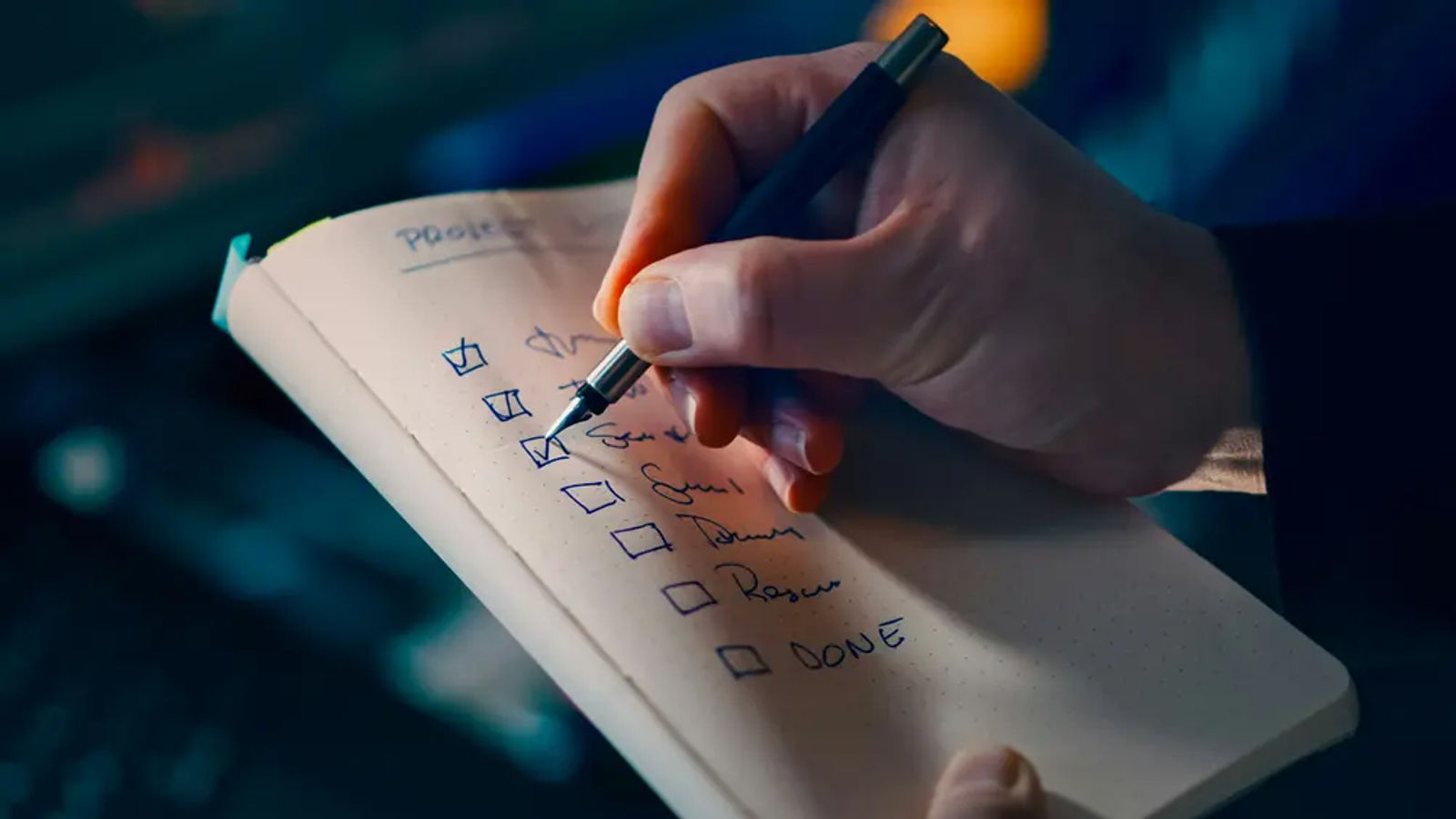 Close-up of a checklist used to review a business sale agreement format