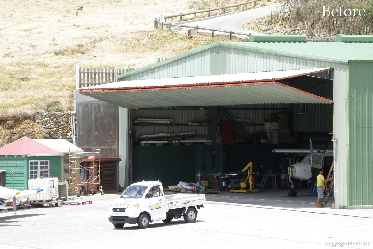 Door of Airplane Hangar before renovation by Bureau Xavier David.