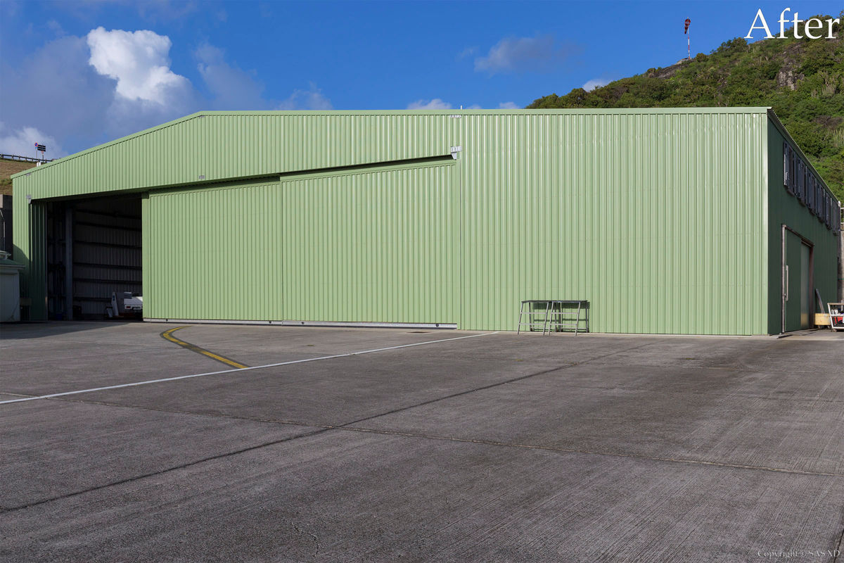 Door of Airplane Hangar after renovation by Bureau Xavier David.