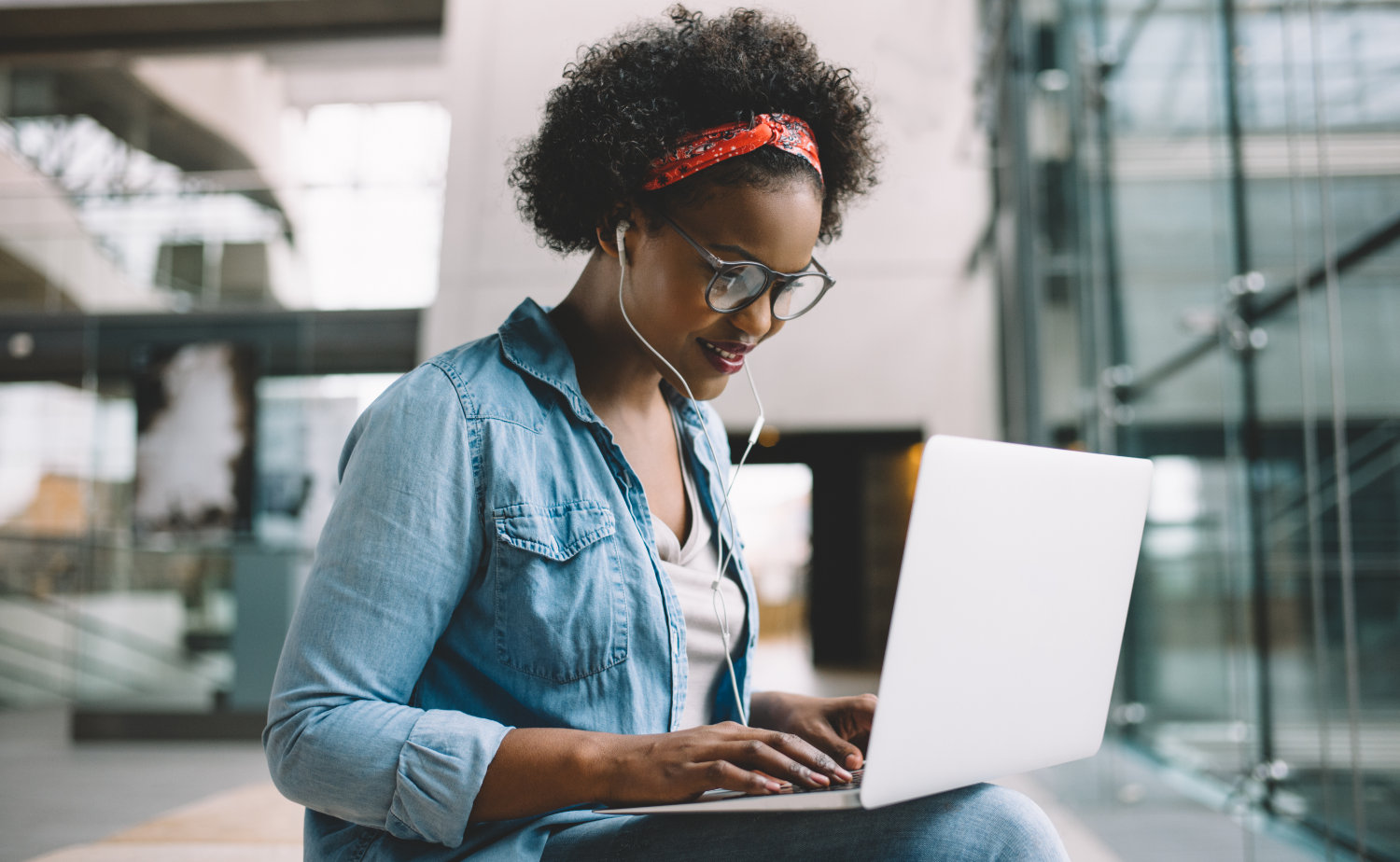 student woman working on a laptop