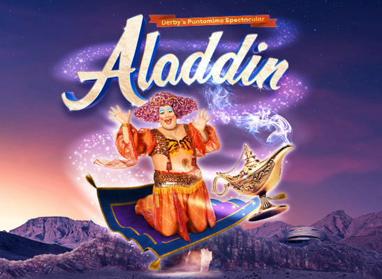 Derby pantomime Aladdin's dame flying on the magic carpet.