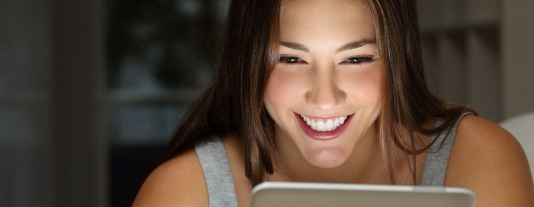 Girl looking at tablet