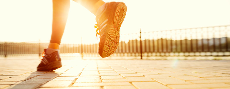 Man/Women running with sunset in background