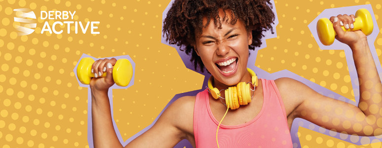 Happy girl with dumb bells