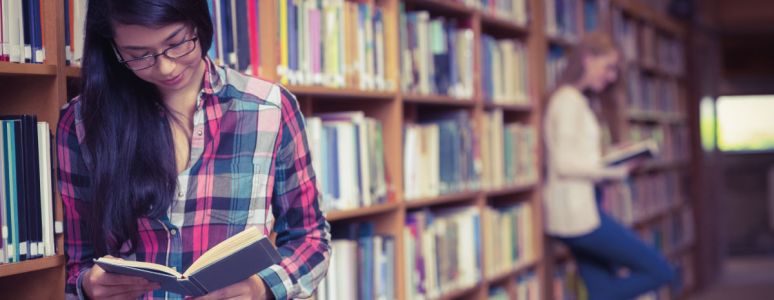 Girl reading in library