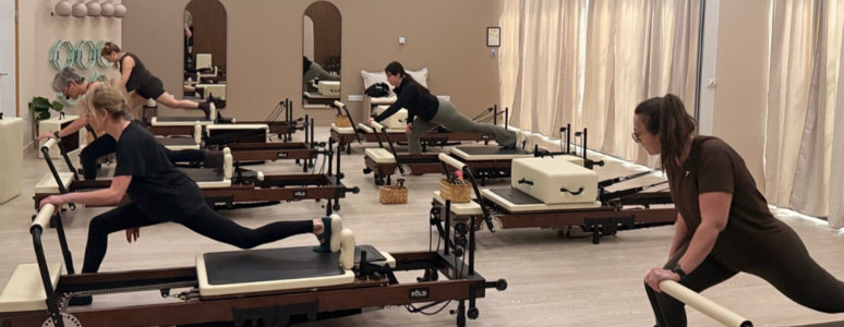 Women at Reformer class at Derby Arena.