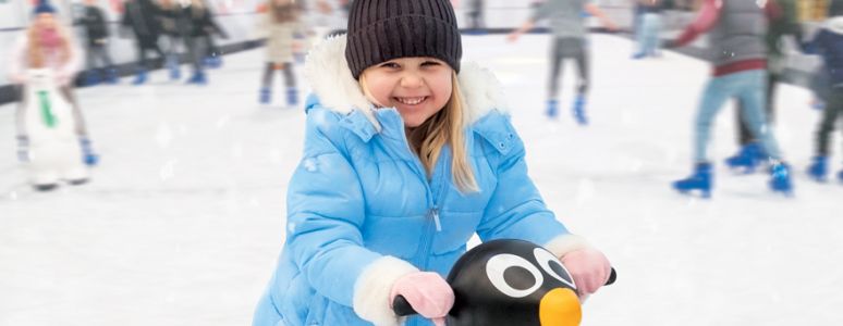 Little girl on derby ice rink