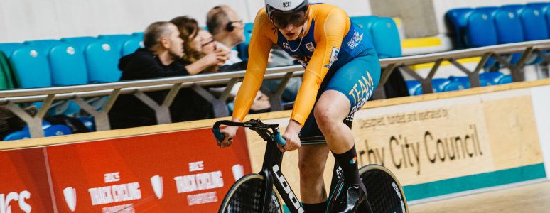 Lewis Fletcher on velodrome track at Derby Arena