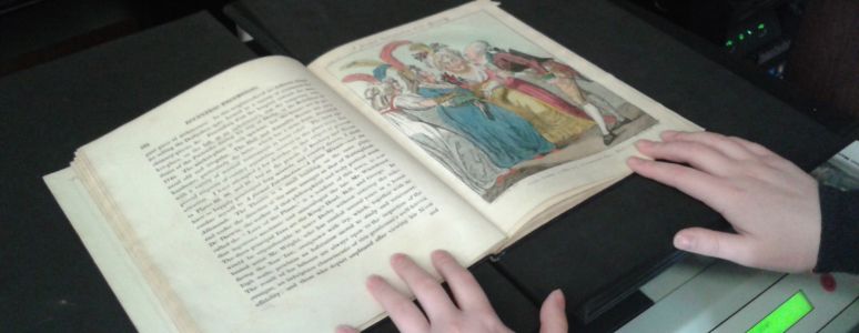 Derby History volunteer helps to scan materials 