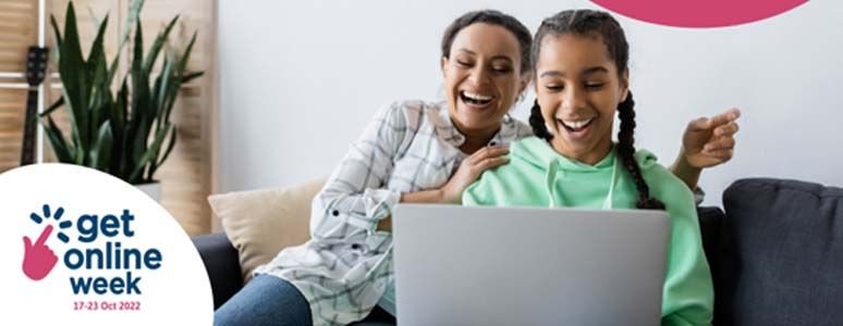 Happy family using computer 