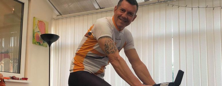 Steve Summers on his static bike at the end of the challenge