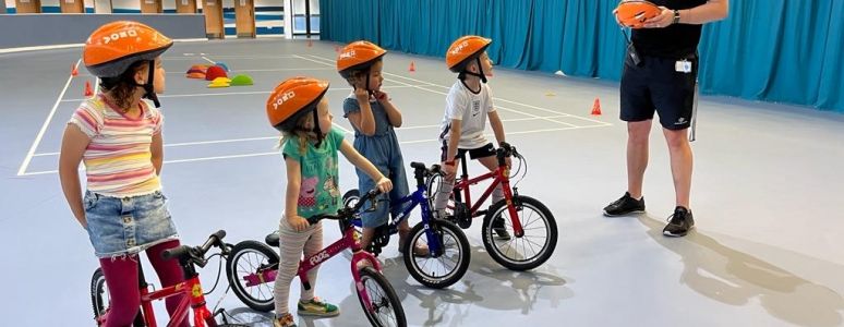 Children on balance bikes at Derby Arena 