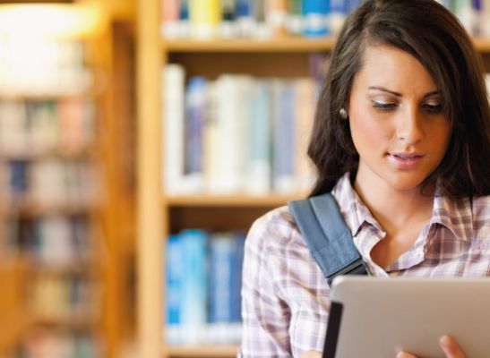 girl reading tablet