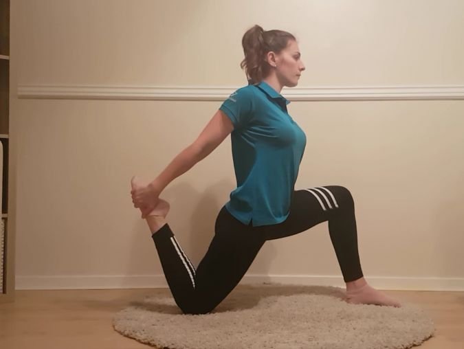 women stretching one foot backward