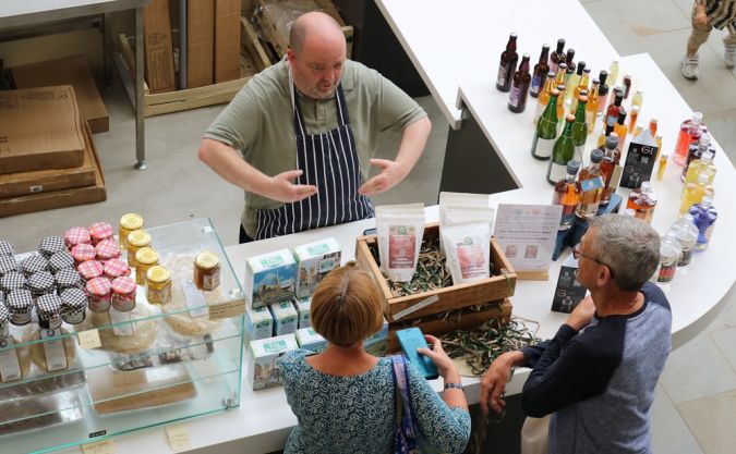 Owner of Derbyshire's Own talks with customers