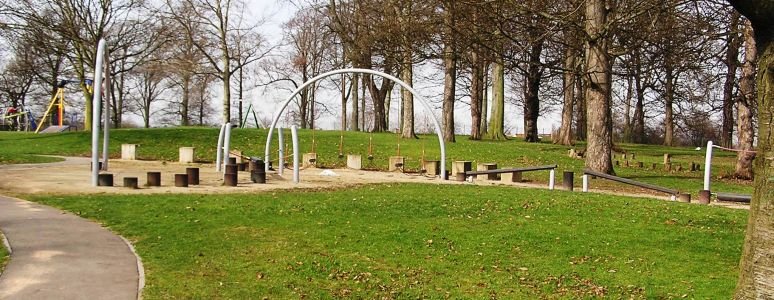 photograph of one area of Osmaston Park Playground with assault course