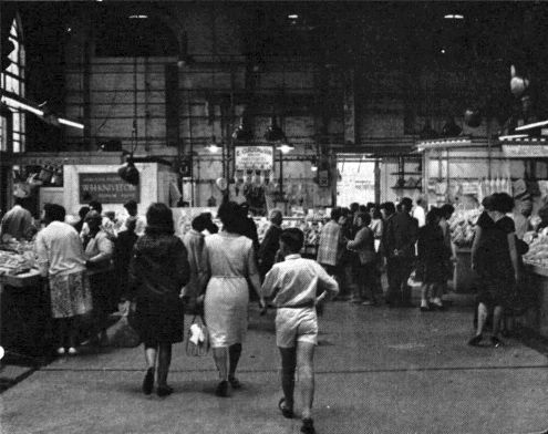 Customers walk through Poultry Market 1964.