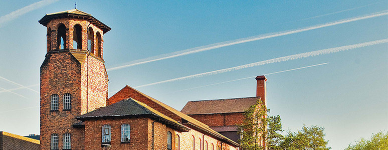 Photograph of Derby Silk Mill against a blue sky