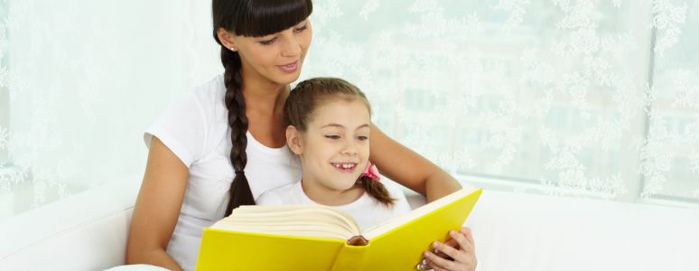 Mother and child reading together