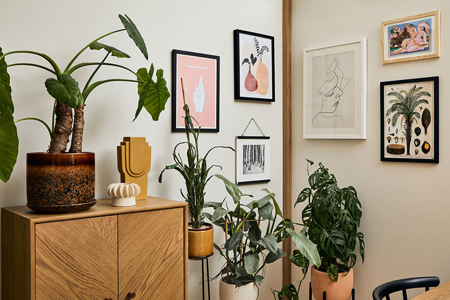 Photography: Beth Davis www.beth-davis.co.uk Various artwork from small independent brands hung on the wall of the style pod