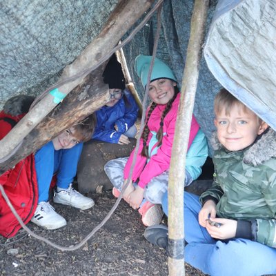 Children in their shelter they built